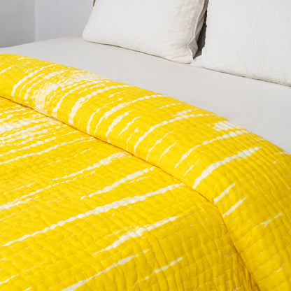 Handmade yellow tie-dye cotton Kantha quilt. Unique, vibrant &amp; cozy. Perfect as a blanket, throw, or wall hanging. Shop now!