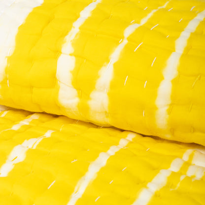 Handmade yellow tie-dye cotton Kantha quilt. Unique, vibrant &amp; cozy. Perfect as a blanket, throw, or wall hanging. Shop now!
