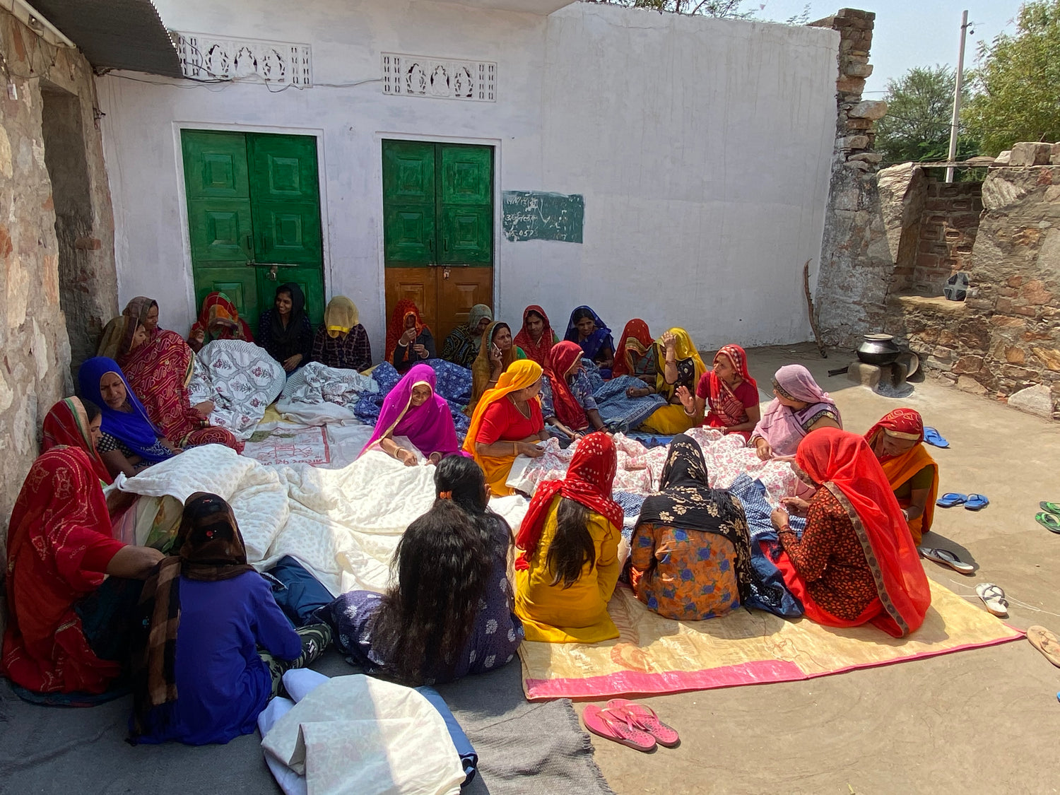 Group of ladies prepare the kantha quilt with there specialization