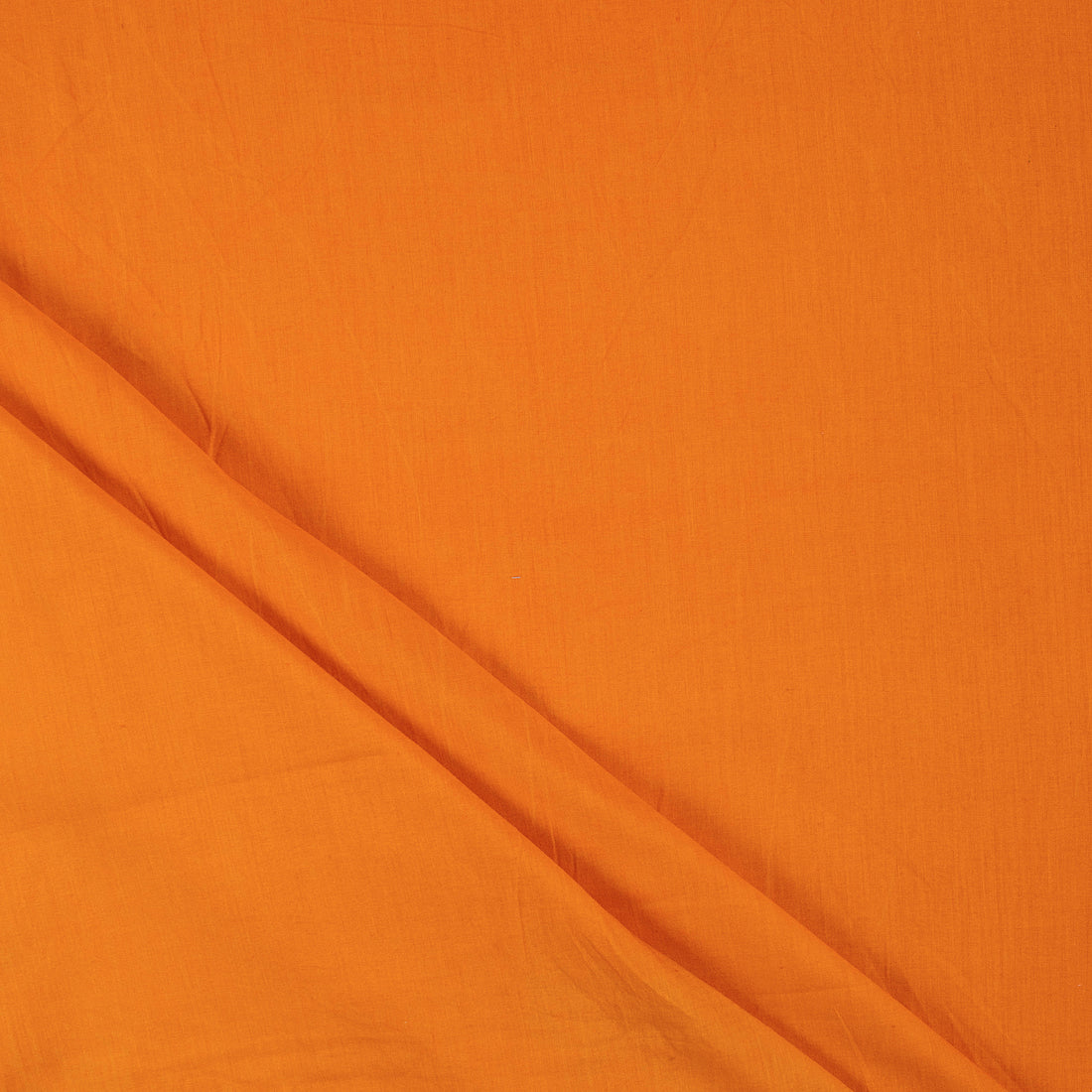 Solid Light Orange Cambric Cotton Fabric